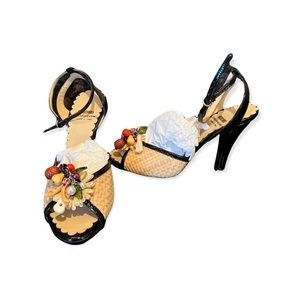Moschino woven and black leather heels with tropical appliqué